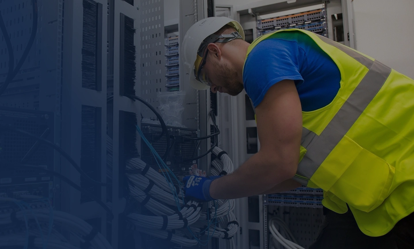 Phone Systems Installation Technician installing business phone system cabling